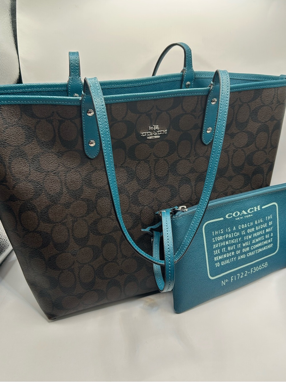 COACH Reversible City Tote Brown Signature Tote with Teal Trim